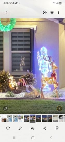 Reindeer And Sleigh With Christmas Tree And Gifts On Sleigh. 