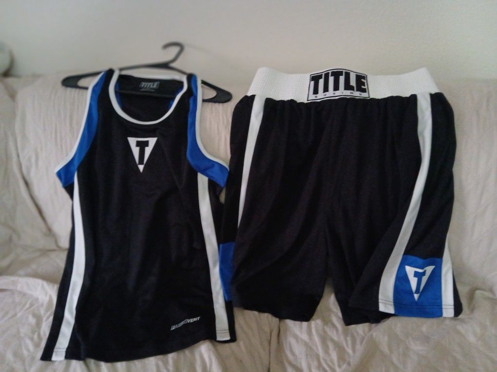 2 Pcs TITLE Boxing Shorts/shirt. https://offerup.com/redirect/?o=TUVESVVNLmxpa2U= New.