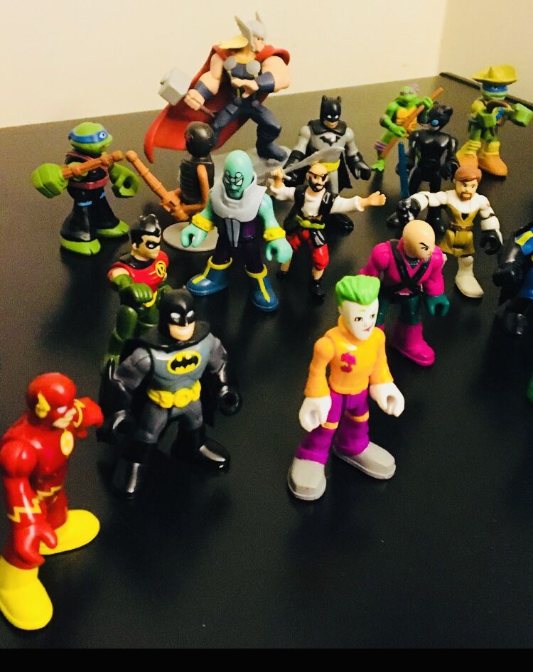 25 Action Figures, Including Batman, Joker, & Wonder Woman