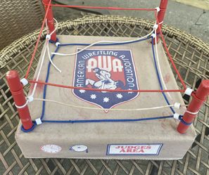 Vintage 1985 American Wrestling Association (AWA) wrestling ring (price $40) part of rope broken