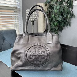 Tory Burch Metallic Logo Bombe Tote in pewter leather.