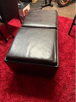 Dark brown leather coffee table with / inside compartments