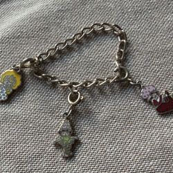 ADORABLE!!! Strawberry Shortcake character charm bracelet with three authentic charms !