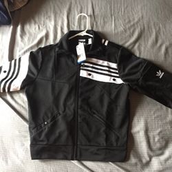 Woman’s Adidas Track Jacket