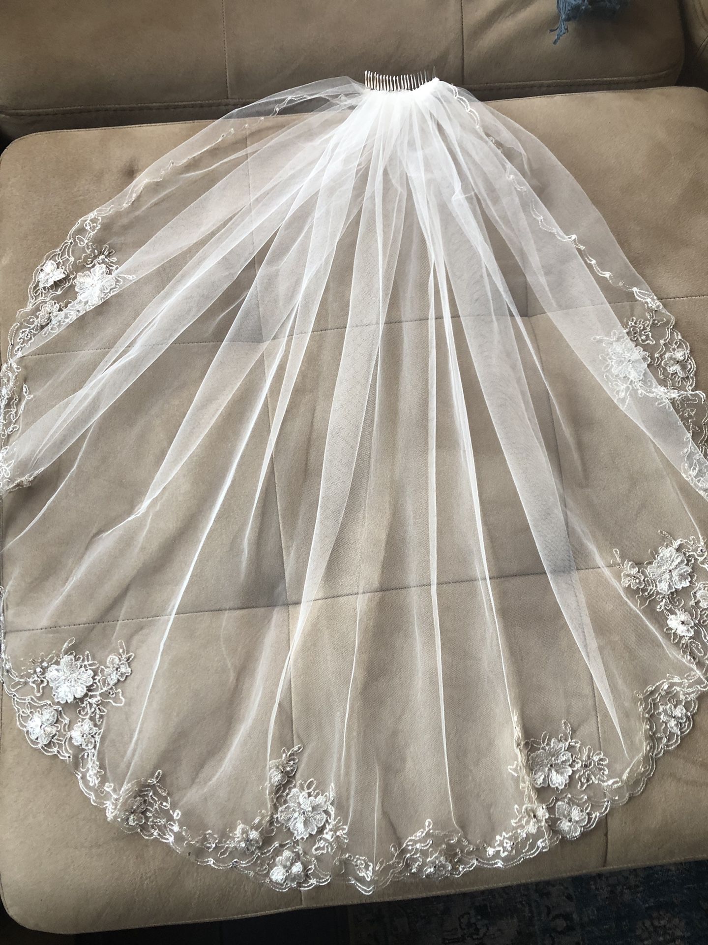 Ivory 32” wedding veil with silver metal comb