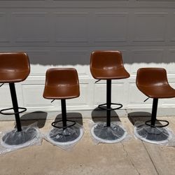 Brand new adjustable height, bar stools