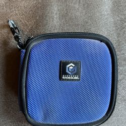 Indigo/Blue GameCube Disc   It is good condition. There are no tears or stains. All of the disc holders are intact. It is an OEM Nintendo brand case. 