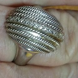 CLEAR WHITE TOPAZ, MULTI  FACETED GEMSTONES SURROUNDED BY STRIPES OF SOLID STERLING. SIZE 10. (R-45001)