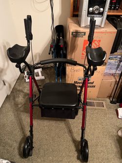 Red foldable upright rollator walker