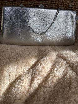 Silver evening clutch bag