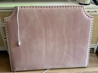 Twin size pink head board with plugs