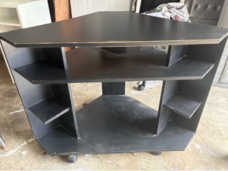 Corner piece entertainment center on wheels
