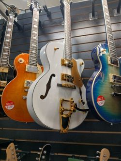 White semi hollow electric guitar