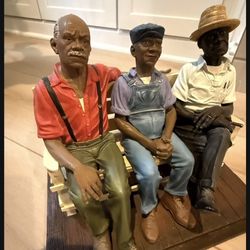 Men Onf The Bench Figurine.