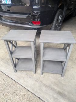 Two matching gray shelves