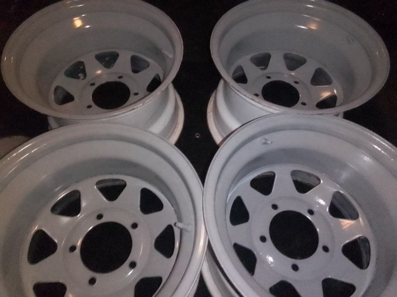 A Set Of Gray Heavy Duty Rims . I Am Open To Make Deal