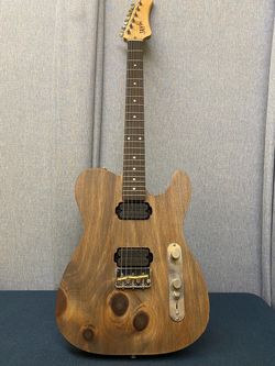 Hand made solid wood guitar