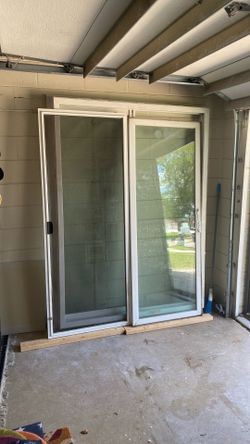 Hurricane impact sliding doors. 80” x 60”