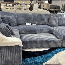 Grey Sleeper Sectional With Storage Chaise Lounge And POP Up Sleeper