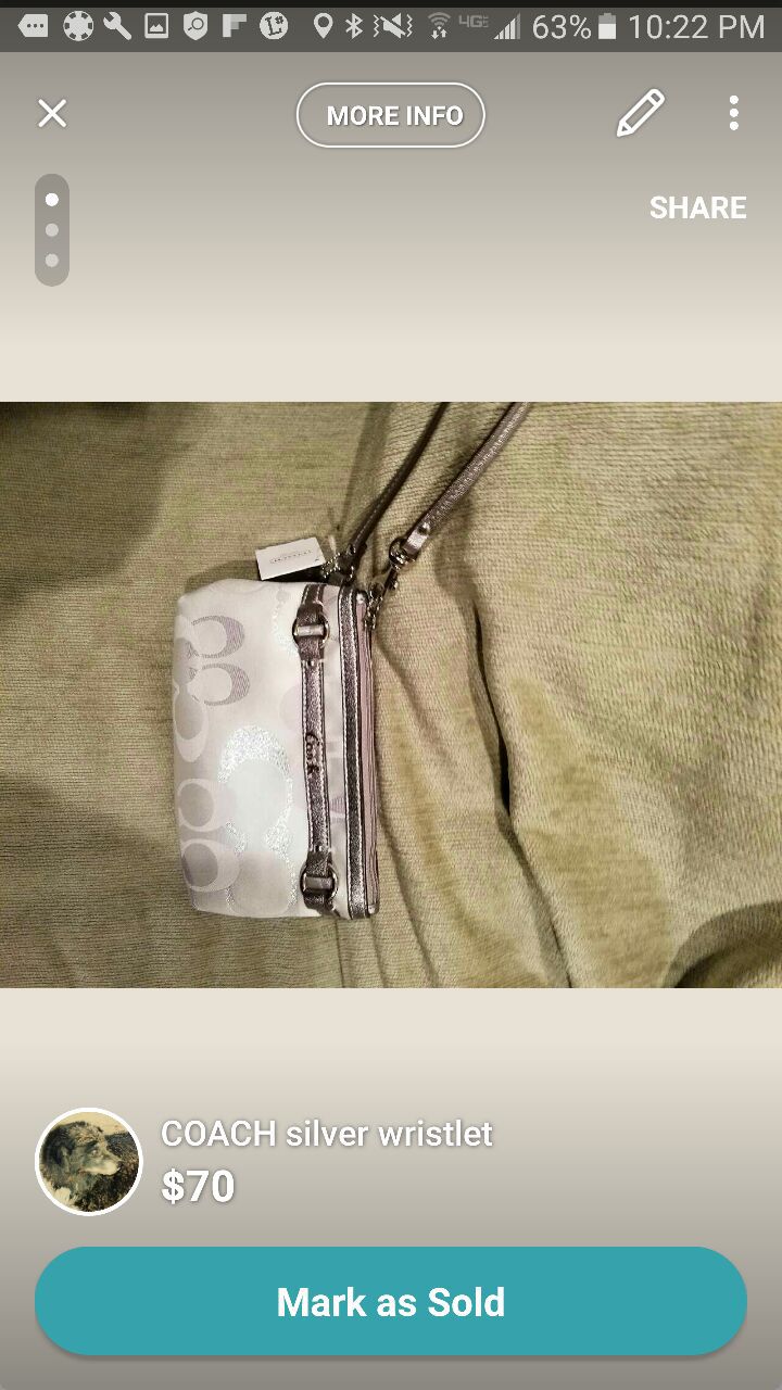 Coach silver wristlet, sales tag still attached!