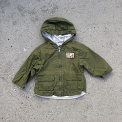 Green and white lightweight windbreaker jacket with a unique size 6 to 12 months 