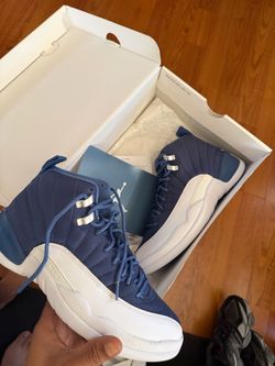 The Air Jordan 12 “Indigo” also referenced as “Stone Blue