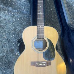 Takamine G-230 acoustic guitar. 