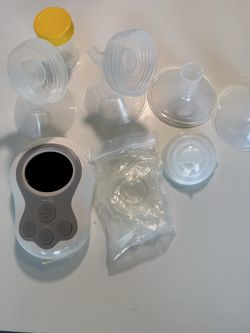Breast pump, milk bags and other baby items