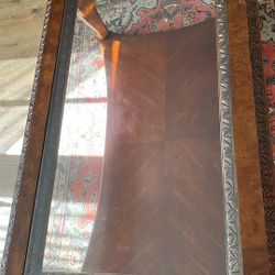 Glass Top Coffee Table With Detail Carving  and Base 