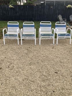 OUTDOOR  CHAIRS - VINYL - BLUE & WHITE  COLOR - I HAVE 4 - $15 FOR ONE - 4 FOR $50