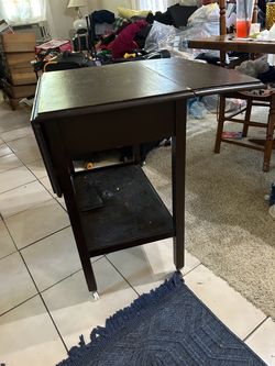 Used arts and crafts vintage table with wings
