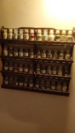 Antique spice rack...includes spices. Downsizing contents of log home