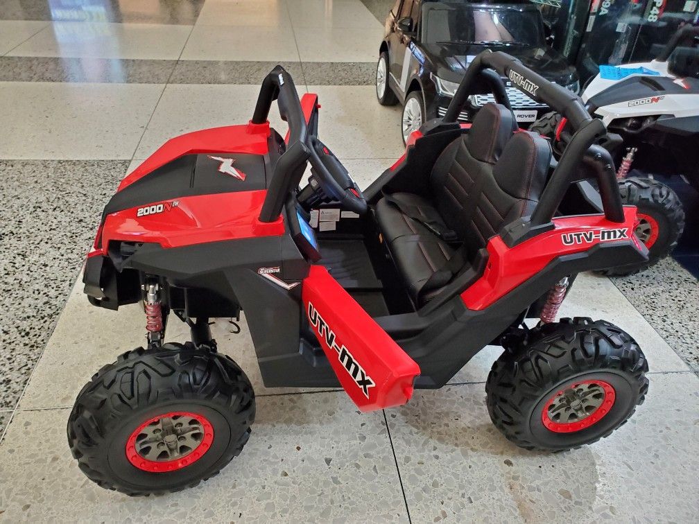 Utv 4x4 Remote control leather seats screen for videos shocks soft tires 6mph