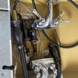 Two Bathroom Faucets and One Kitchen Faucet 