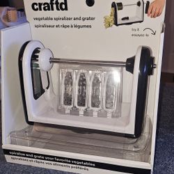 Vegetable spiraling grater tool