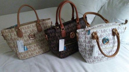 New purses Mk young avalible in 3 different colors...$50 each