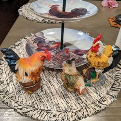 Rooster and chicken figures and plates and paper towel holder