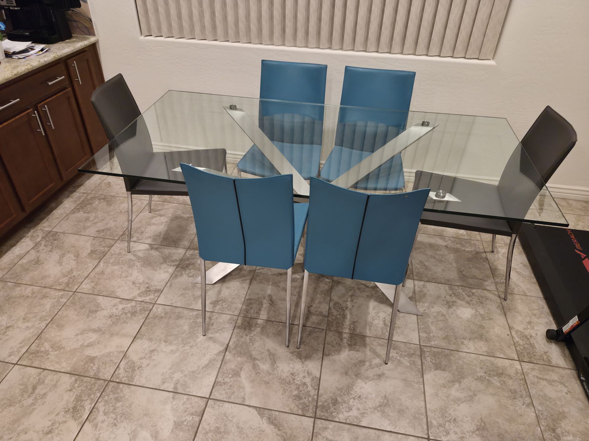 Modern glass table with Copenhagen leather chairs