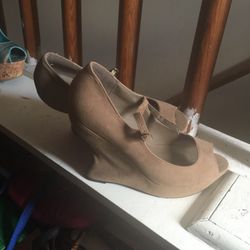 Taupe colored wedge heel