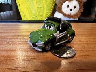 DISNEY PIXAR CARS - DIECAST CRUZ BESOURO WITH HEADPHONES - GREEN LIKE NEW