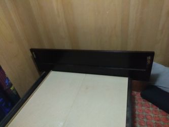 Twin bed with frame.