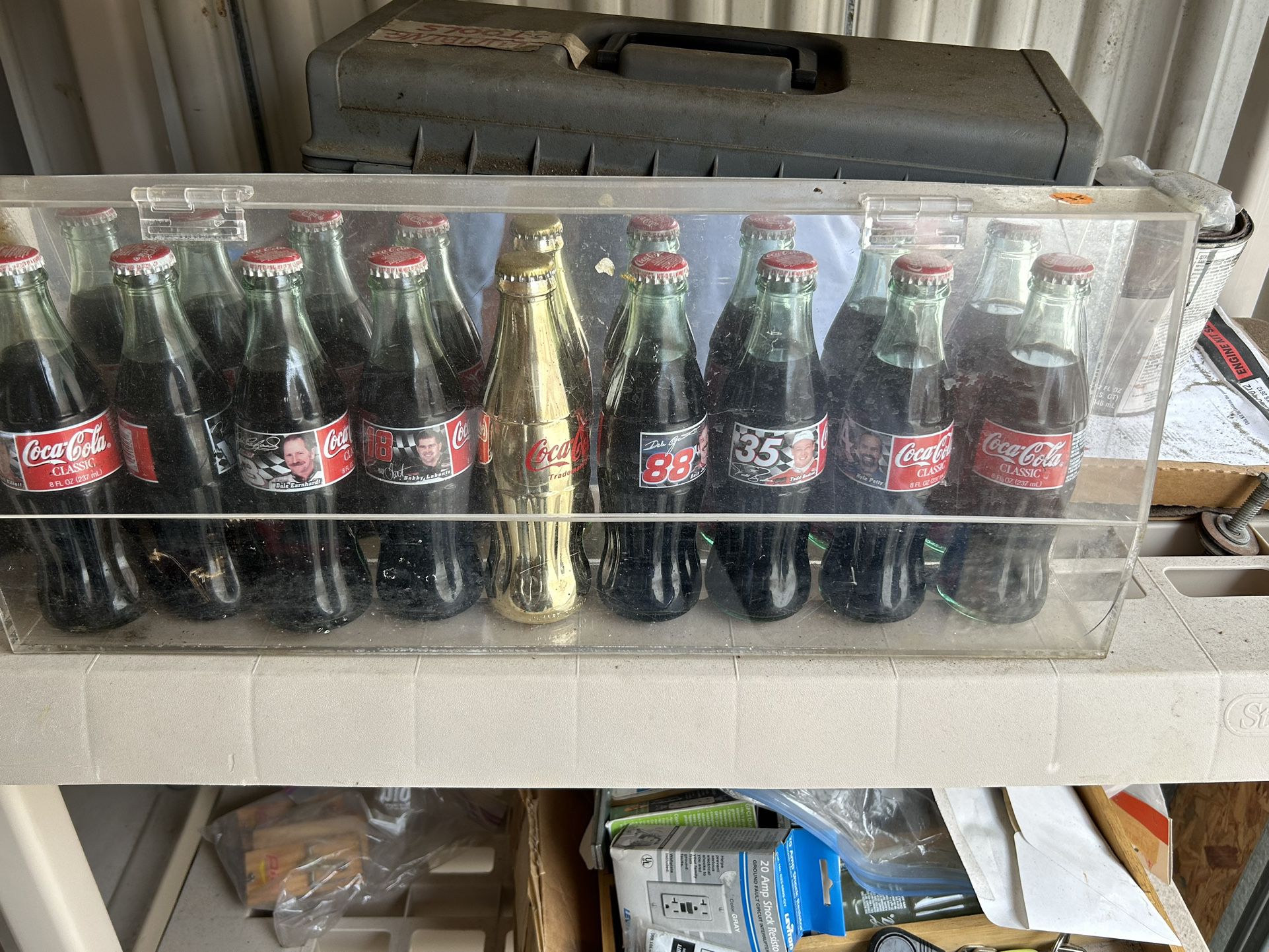 Collectible Coke bottles In Case