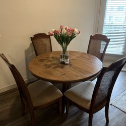 Circular Table With 4 Chairs (decor not included)