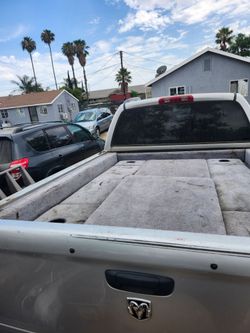 Truck bed storage compartment