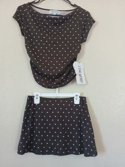 Set 2 piezas falda short y blusa size S