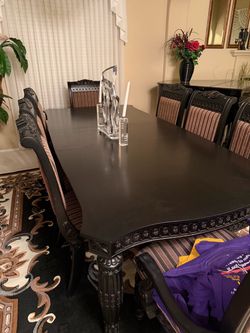 Eight chair dining table and hutch
