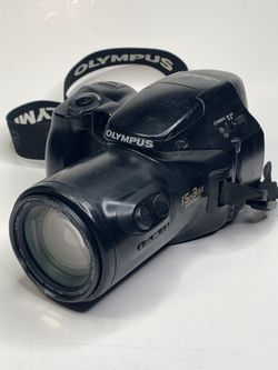 Olympus IS-3 DLX 35mm SLR Film Camera with 35-180mm Zoom Lens