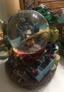 A bugs life musical Disney globe