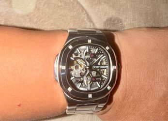 Beautiful all stainless steel watch with real diamonds Automatic skeleton 43 mm watch in flawless condition box included value of 1k watch has genuine