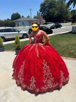Red and gold sparkly dress